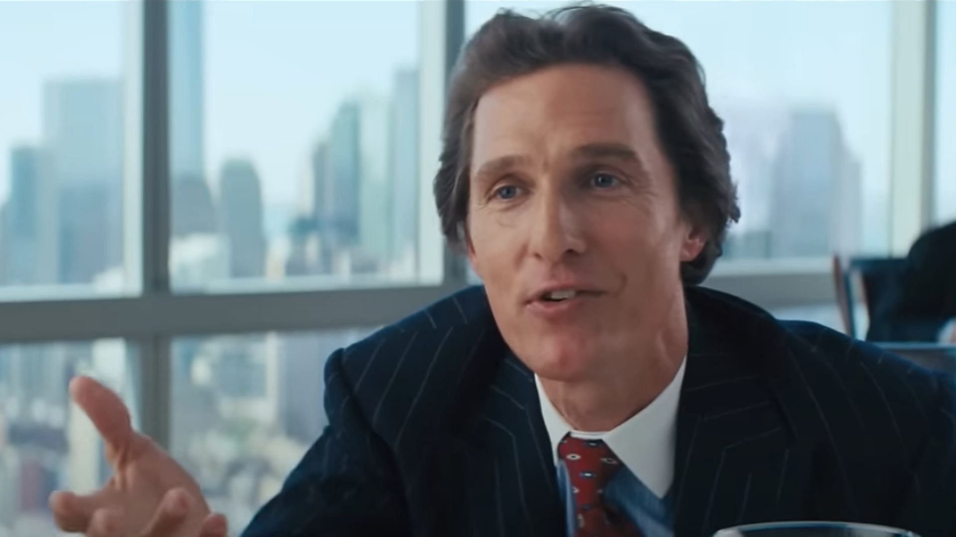 McConaughey plays Belfort's mentor (Image via YouTube/Paramount Pictures)